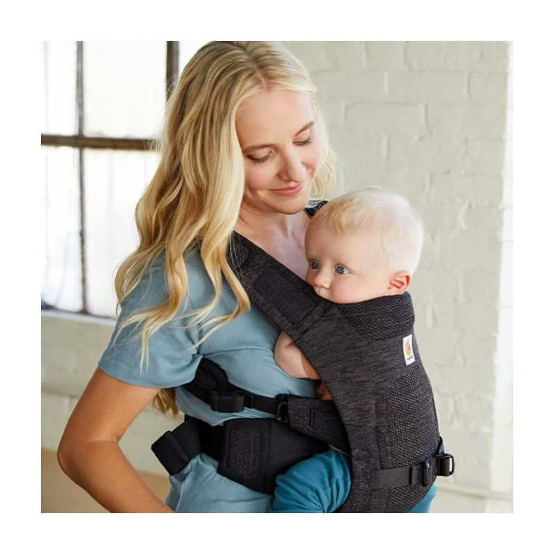 Mom carrying baby in Ergobaby Aerloom, Lightweight & Breathable - Charcoal Black carrier | Babymaxi