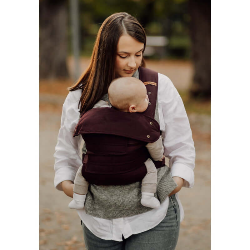 Mom wearing Marsupi Classic - Berry baby carrier with baby comfortably strapped | Babymaxi