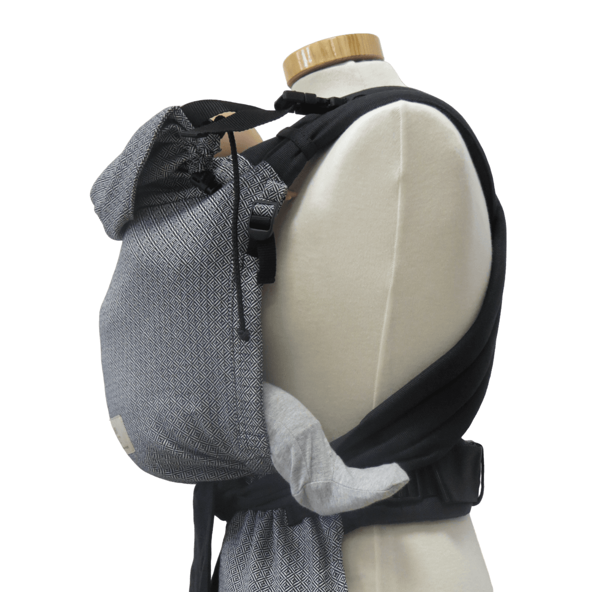 Storchenwiege Talemo Half-Buckle Baby Carrier - Leo Black White on mannequin showcasing adjustable fit | Babymaxi