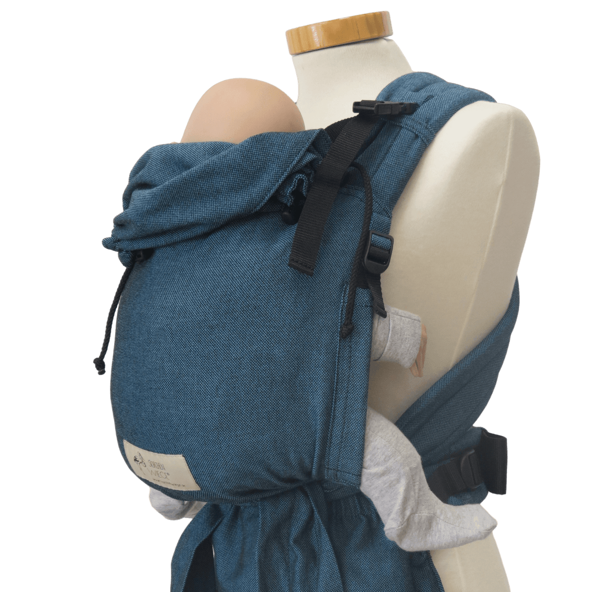 Storchenwiege Talemo Half-Buckle Baby Carrier - Turquoise with baby, showcasing optimal adjustable wrap-style design | Babymaxi