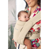 Ergobaby Embrace Soft Air Mesh - Cream baby carrier shown with infant, highlighting comfort and breathable mesh design | Babymaxi