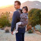 Father carrying child in Ergobaby Omni Breeze - Graphite Grey baby carrier, perfect for comfort and breathability | Babymaxi