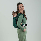 Isara Preschooler (up to 30kg) - Evergreen Linen baby carrier in use, child on mother's back | Babymaxi