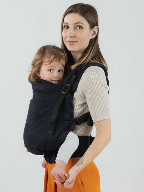 Isara Preschooler (up to 30kg) - Noire baby carrier shown with a child in a front carry position | Babymaxi