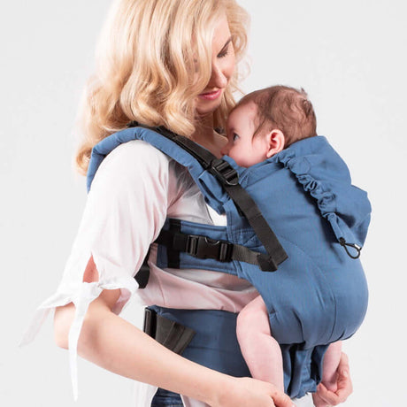 Isara The One - Bluestone ergonomic baby carrier in use, offering comfort and style for parents and infants | Babymaxi