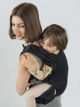 Isara The One - Noire ergonomic baby carrier in use, designed for all body types and ages | Babymaxi