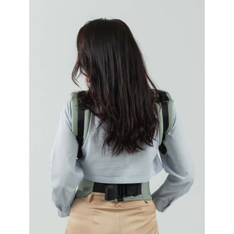 Isara The One - Sage Green Linen baby carrier shown from the back, highlighting ergonomic design and stylish neutral tones | Babymaxi