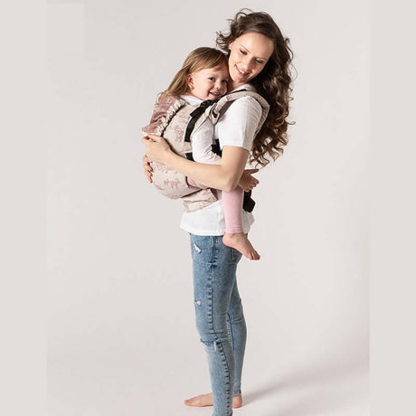 Isara The One - Wildlife Sandy, WWF Collaboration baby carrier with mom and toddler smiling together | Babymaxi