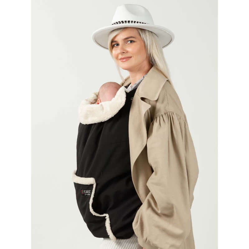Isara Winter Baby Carrier Cover - Ultra Black on a mother with baby, showcasing warmth, comfort, and style | Babymaxi
