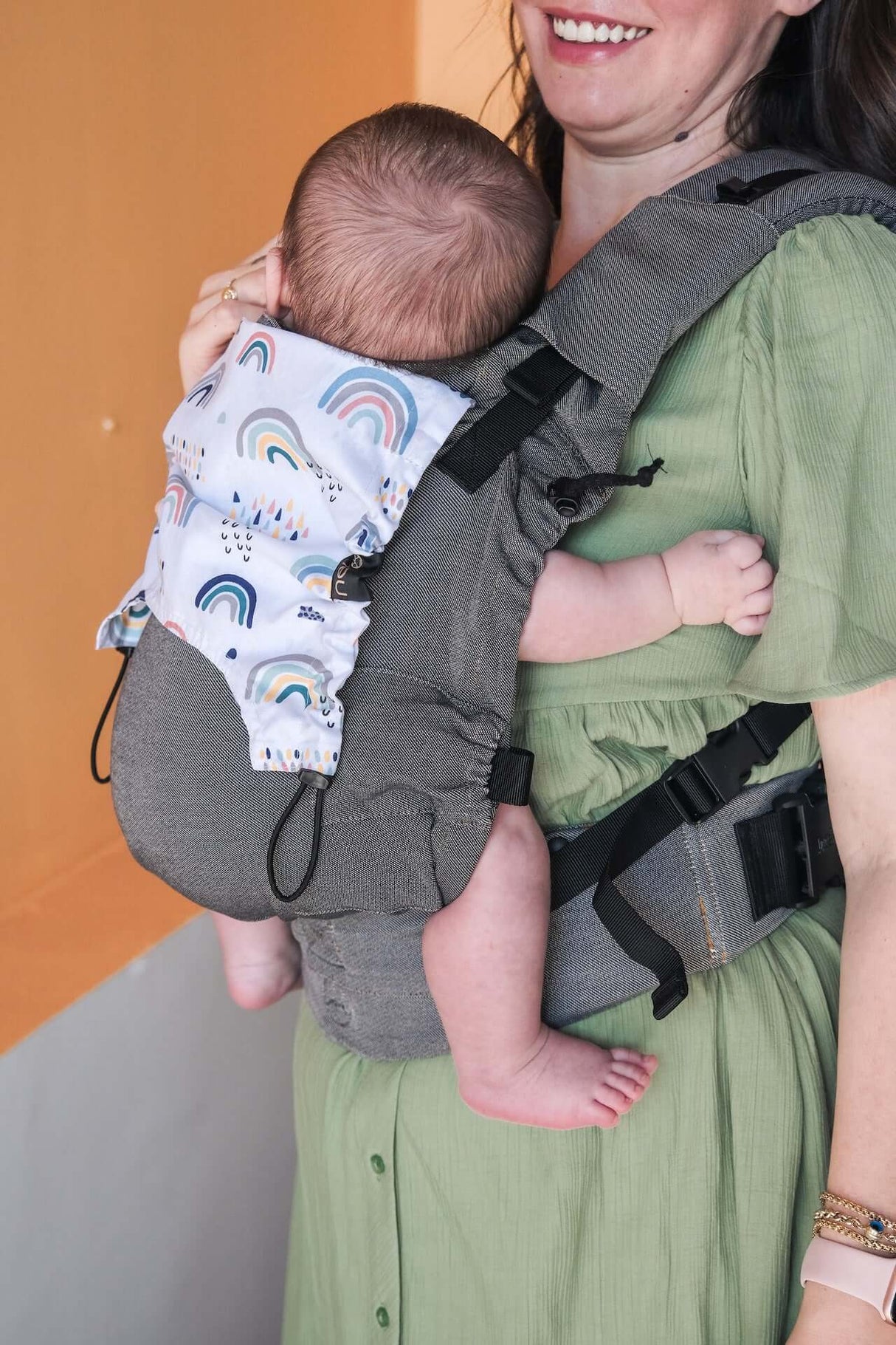 Neko Switch Baby Carrier - Bold, 2 extra hoods in use by parent with baby, showcasing ergonomic design and comfort | Babymaxi