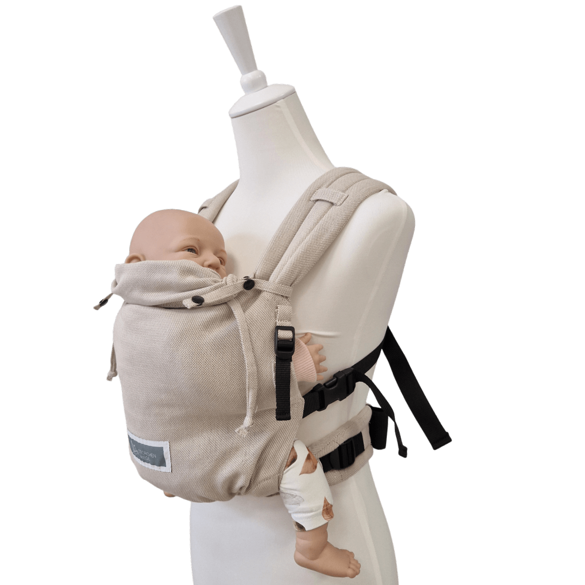 Stochenwiege Valeno Baby Carrier - Moonstone in use with a mannequin and baby doll | Babymaxi