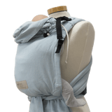 Storchenwiege Talemo BabyCarrier - Aqua displayed on mannequin, featuring adjustable buckle waist and wrap-style shoulder straps | Babymaxi