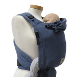 Storchenwiege Talemo Half-Buckle Baby Carrier - Denim with baby on mannequin | Babymaxi