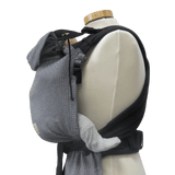 Storchenwiege Talemo Half-Buckle Baby Carrier - Leo Black White on mannequin showcasing adjustable fit | Babymaxi