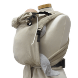 Storchenwiege Talemo Half-Buckle Baby Carrier - Natural on mannequin, adjustable waist belt and wrap-style straps | Babymaxi